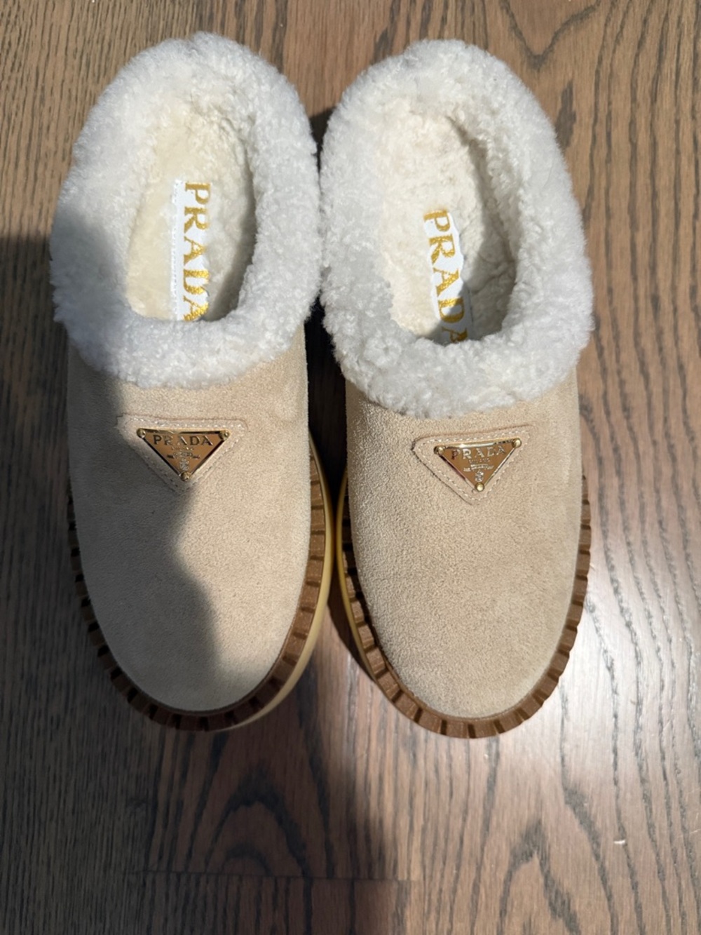 Prada Beige Suede Shearling Slip-On Clogs with Gold Logo